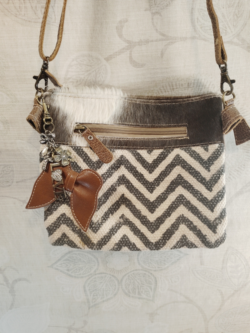 Myra Bag Cream and Brown Chevron Crossbody with Leather Bow Charm